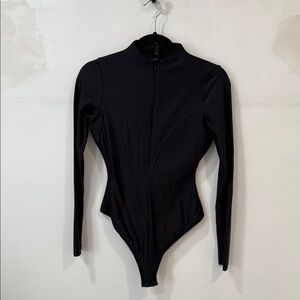 SKIMS long sleeve black bodysuit with front zipper